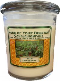 Wild Cranberry candle in clear glass jar with glass lid handcrafted by None of Your Beeswax Candle Company